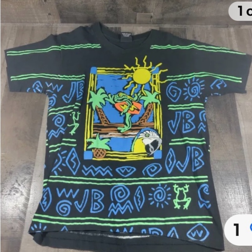 Vintage official Jimmy Buffett all over print 90s t-shirt. Good condition.
